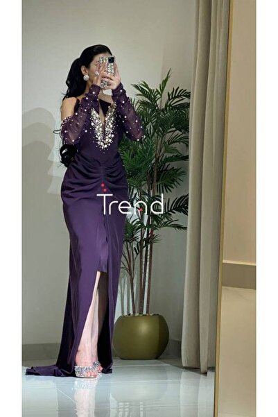 TREND Evening dress with pearl sleeves