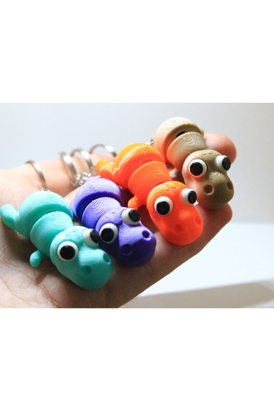 3DMakineSepeti سلسلة مفاتيح متحركة صغيرة ولطيفة على شكل ديناصور - 4 ألوان (مع...