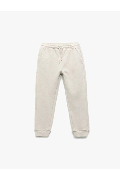 Koton Basic-Jogginghose aus Baumwolle mit Schnürung an der Taille und struktu...