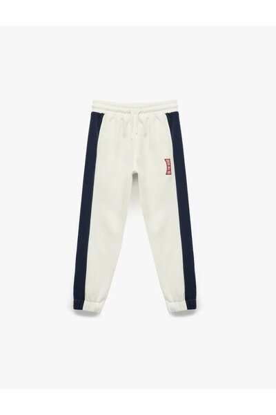 Koton Φούτερ Jogger με τρεις ρίγες, τσέπες, ελαστική μέση και αντίθεση χρωμάτων