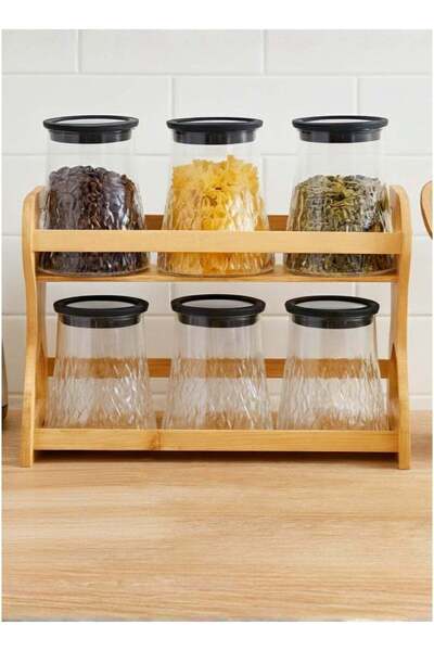 ALQANNAS 6-piece glass spice container, two-tiered, with a sturdy wooden stand.