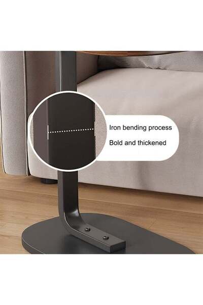 Taimi Modern coffee table | C-shaped side table with a black wooden top and black metal frame, 63x30x45 cm