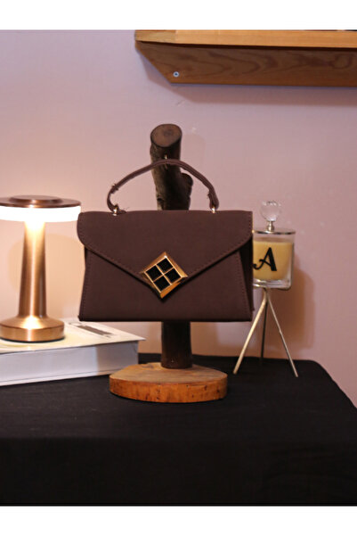 Alvora حقيبة يد وكتف صغيرة بغطاء بإبزيم هندسي من جلد الغزال