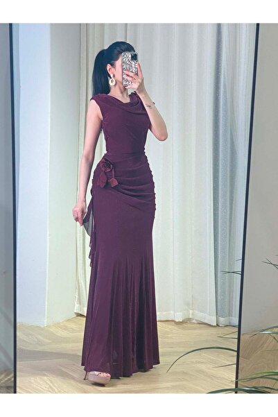 Opera Fashion A soft, stretchy burgundy dress adorned with roses at the waist and shoulder.