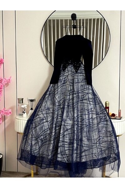 Thara A navy blue dress with sleeves, suitable for elegant evening wear.