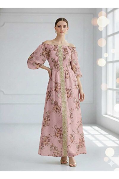 Generic A chiffon maxi dress with an off-shoulder cut and tuxedo gathering.