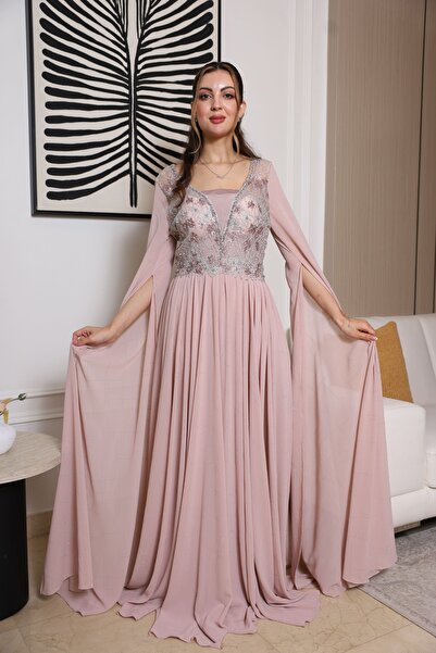 molan fashion A glamorous evening gown in a warm pink hue, designed to give you a regal presence from the very first step.