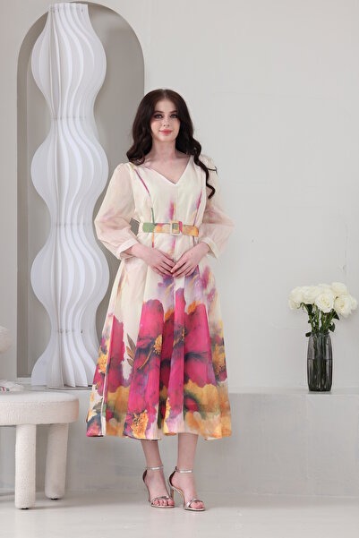 Verona Trading Company Chiffon midi dress with a large floral print and a matching belt.