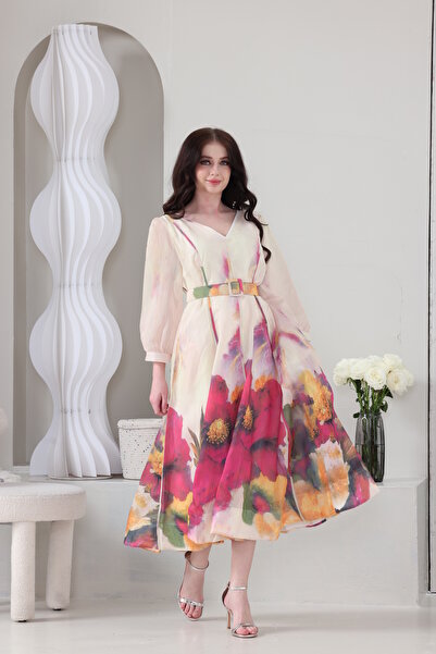 Verona Trading Company Chiffon midi dress with a large floral print and a matching belt.