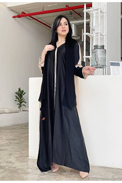 Leatherthreads A luxurious two-tone abaya with delicate embroidery on the edge.