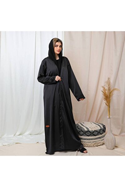 Leatherthreads A luxurious black abaya made of soft silk with delicate embroidery along the edge.