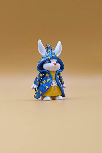 Rodopiva سلسلة مفاتيح على شكل أرنب ساحر يرتدي عباءة نجمية لطيفة، زينة متحركة للحقائب