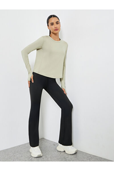 Styli Pack of 3 - Multi Cross Back Padded Sports Bra, Paneled Top and Flared Leggings