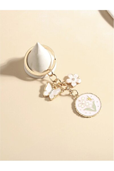 VEYA An elegant bell-shaped flower and crystal charm — a charming and perfect bag accessory