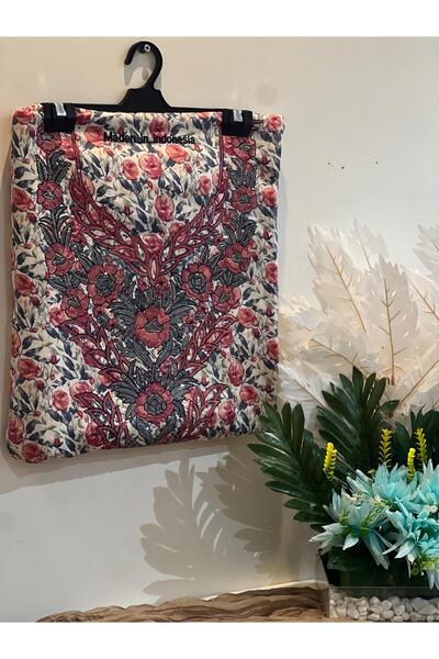 REHAM Emirati-style embroidered fabric, soft silk.