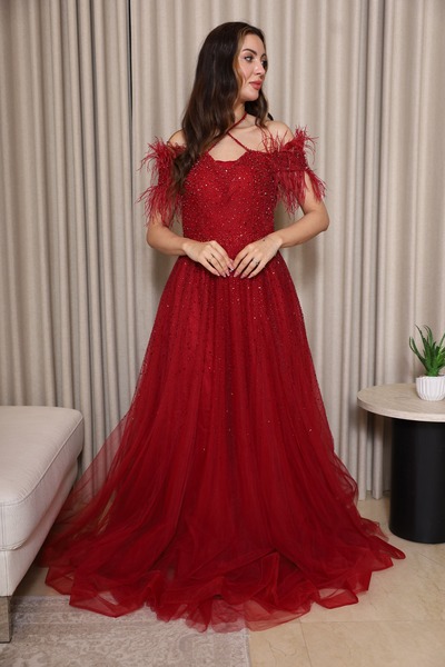 molan fashion A fiery red evening dress that steals the show from the first moment, for lovers of bold and luxurious looks.