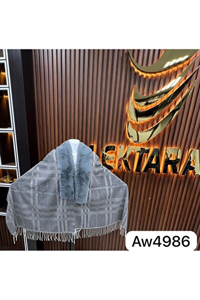 GENERAL A winter shawl is a warm, wide accessory used to cover the neck, often made of wool.