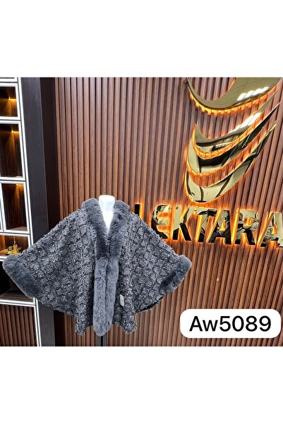 GENERAL A winter shawl is a warm, wide accessory used to cover the neck, often made of wool.