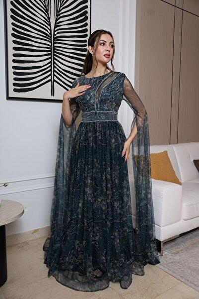 molan fashion A long evening dress in a dark green color with a hint of blue, with embroidery and a sheen that suggests you are wearing a piece of heaven.