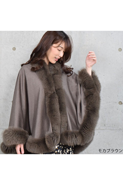 lamsat fn A sophisticated winter fur shawl for a warm, feminine look; warmth and luxury in one piece.