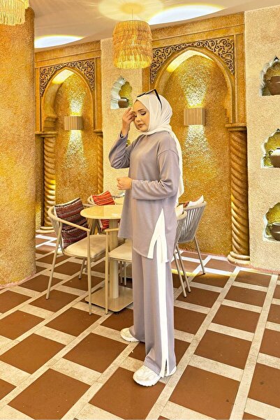 EBRUTESETTÜR بدلة مزدوجة باللون الرمادي مع تفاصيل شق مخططة باللون الأبيض