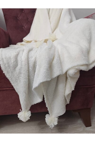 Hümzeyy home Tv battaniyesiponponlu modeliyle çok konforlu bir görünüm sunar ...