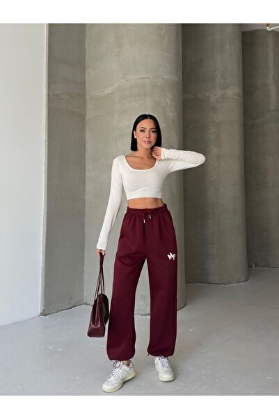moda paketi Γυναικείο παντελόνι – Άνετο κομμένο, παντελόνι jogger με λεπτομέρεια από λευκό κέντημα