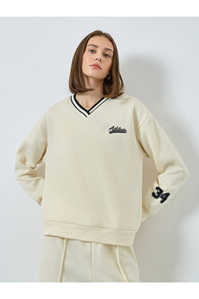 Styli Women Off White Varsity Sweatshirt