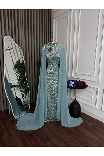 Generic Luxurious evening gown with full beadwork - embroidered trim with a flowing chiffon cape - in a captivating Tiffany blue