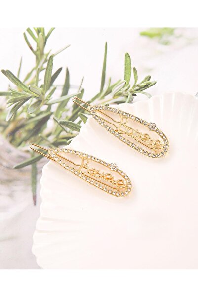 REBORN DESIGN مشبك جانبي معدني ذهبي اللون من داملا موديل بيليف مع تفاصيل حجر ...