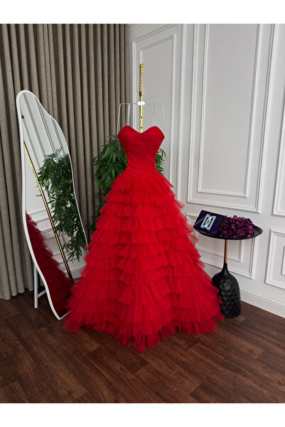 Generic Multi-layered tulle evening dress - flared skirt with a long train - bold strapless design in fiery red