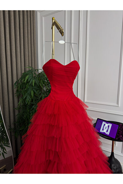 Generic Multi-layered tulle evening dress - flared skirt with a long train - bold strapless design in fiery red
