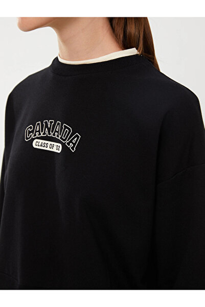 LC Waikiki Lcw Modest Black Crew Neck Printed Long Sleeve Oversized Women's Sweatshirt Tunik