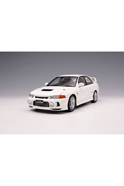 MotorHelix Mitsubishi Lancer Evolution IV, Alb Scoția, 1999 - Ediție limitată 1299 buc. 1:18