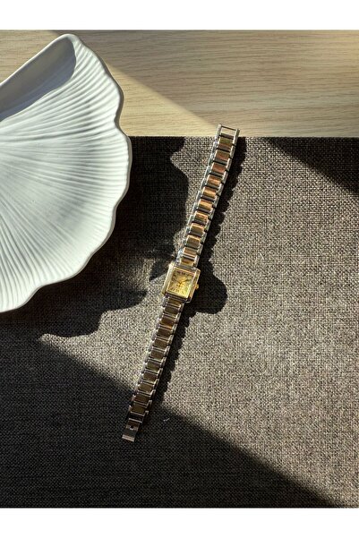 rubsey ساعة يد نسائية كلاسيكية بتصميم معدني بسيط مع حزام داخلي أصفر