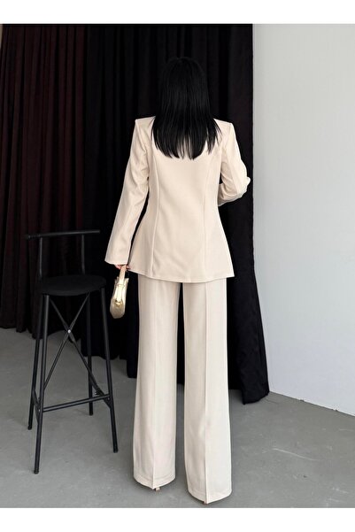 ossons Двокомпонентний костюм з плісированою спідницею