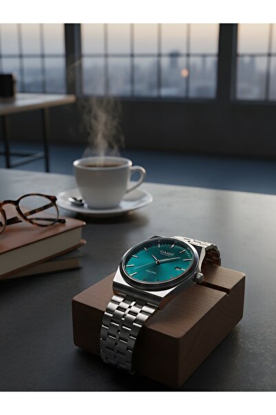 cs Classic steel round watch with a green dial