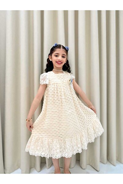 DORA AL NUJOOM TRADING COMPANY فستان بناتي بتفاصيل مكشكشة على شكل طبقات متتالية