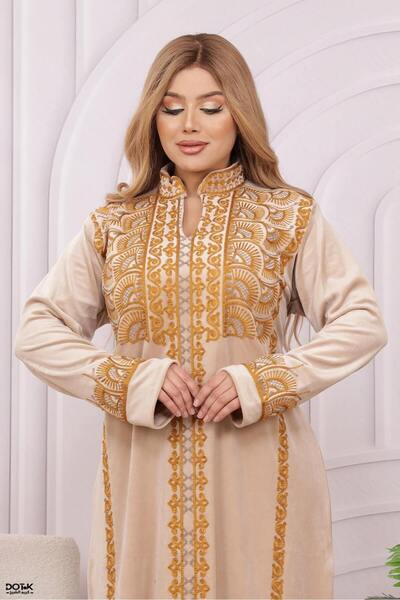 Lyaly aljlabyh A velvet winter jalabiya with elegant "shoulder and arm" embroidery, a modest and modern look.