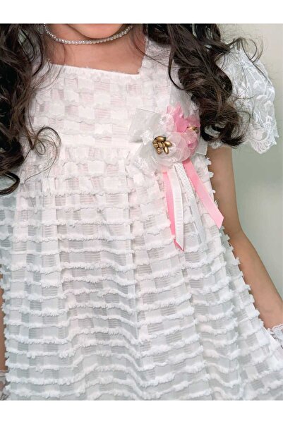 Generic Girls' dress with ruffled details in cascading layers