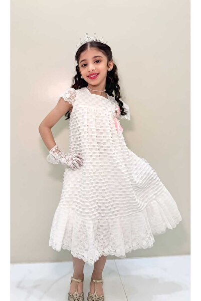 Generic Girls' dress with ruffled details in cascading layers