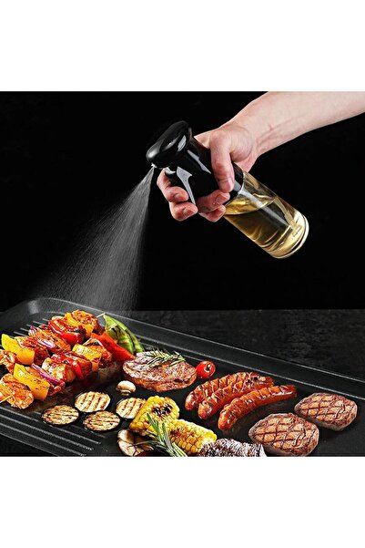 Generic A versatile glass oil sprayer for cooking, grilling, and salad preparation.