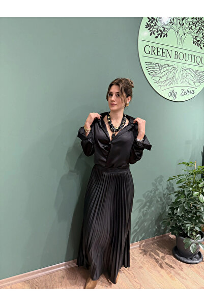 Greenboutique تنورة طويلة مطوية ولامعة