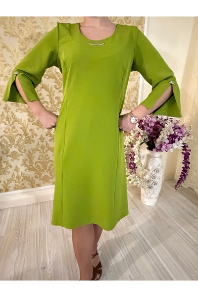 GIONI CONF Plain dress with metallic accessories