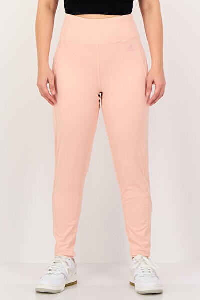 adidas بنطال ليجنز رياضي طويل للنساء، لون خوخي فاتح