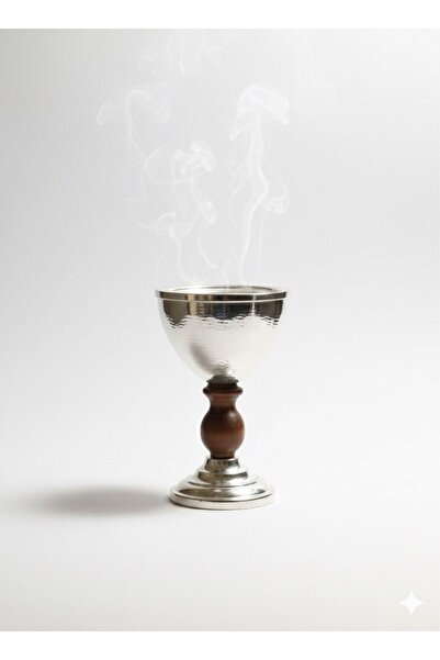 MDK A luxurious silver incense burner with an elegant wooden base. A classic design for incense burning with a distinctive modern touch.