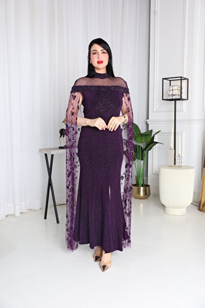 berlanty A long evening dress with a purple shimmer, featuring an embroidered...