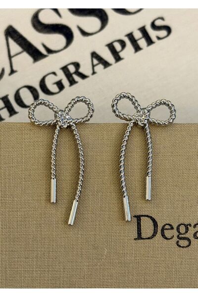 MioArt أقراط نسائية بفيونكة صفراء