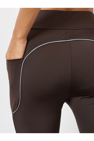 Styli Back Single Reflective Strip Pocket Detail Flared Leggings