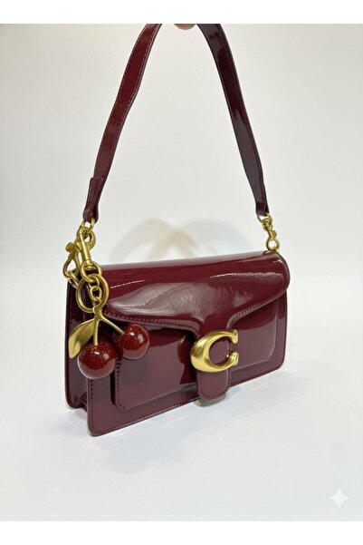 loş Women's patent leather C-shaped handbag with a cherry charm and a long external strap